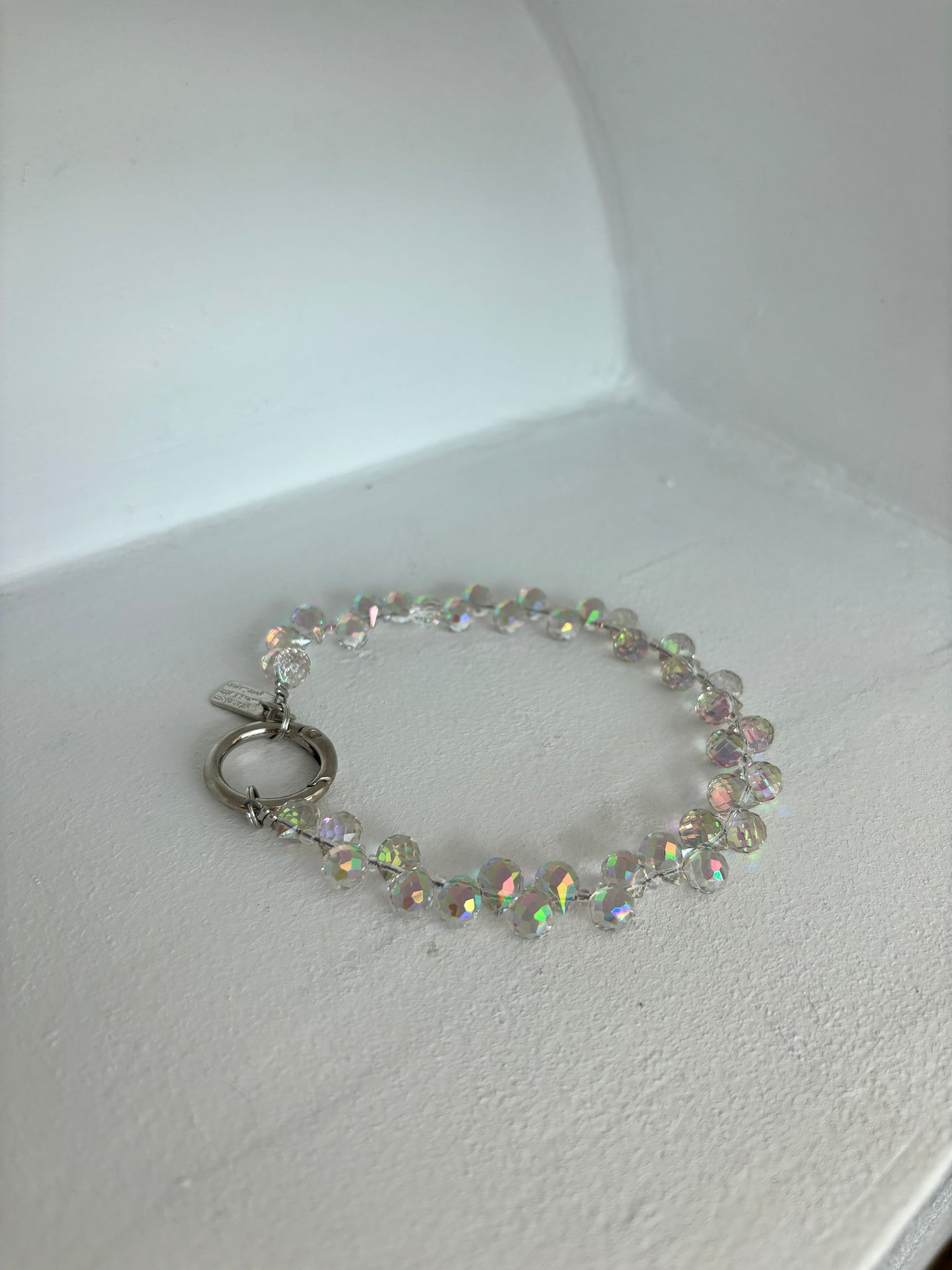 PRISMATIC PHONE WRISTLET