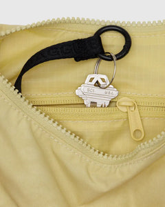 SMALL NYLON CRESCENT BAG - BUTTER