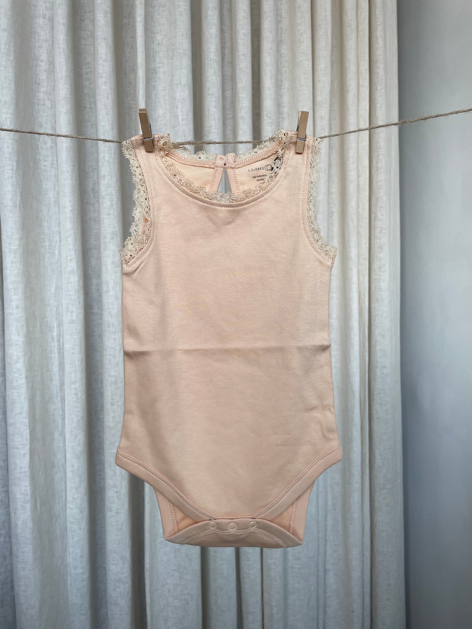 LACEY BABY ONESIE