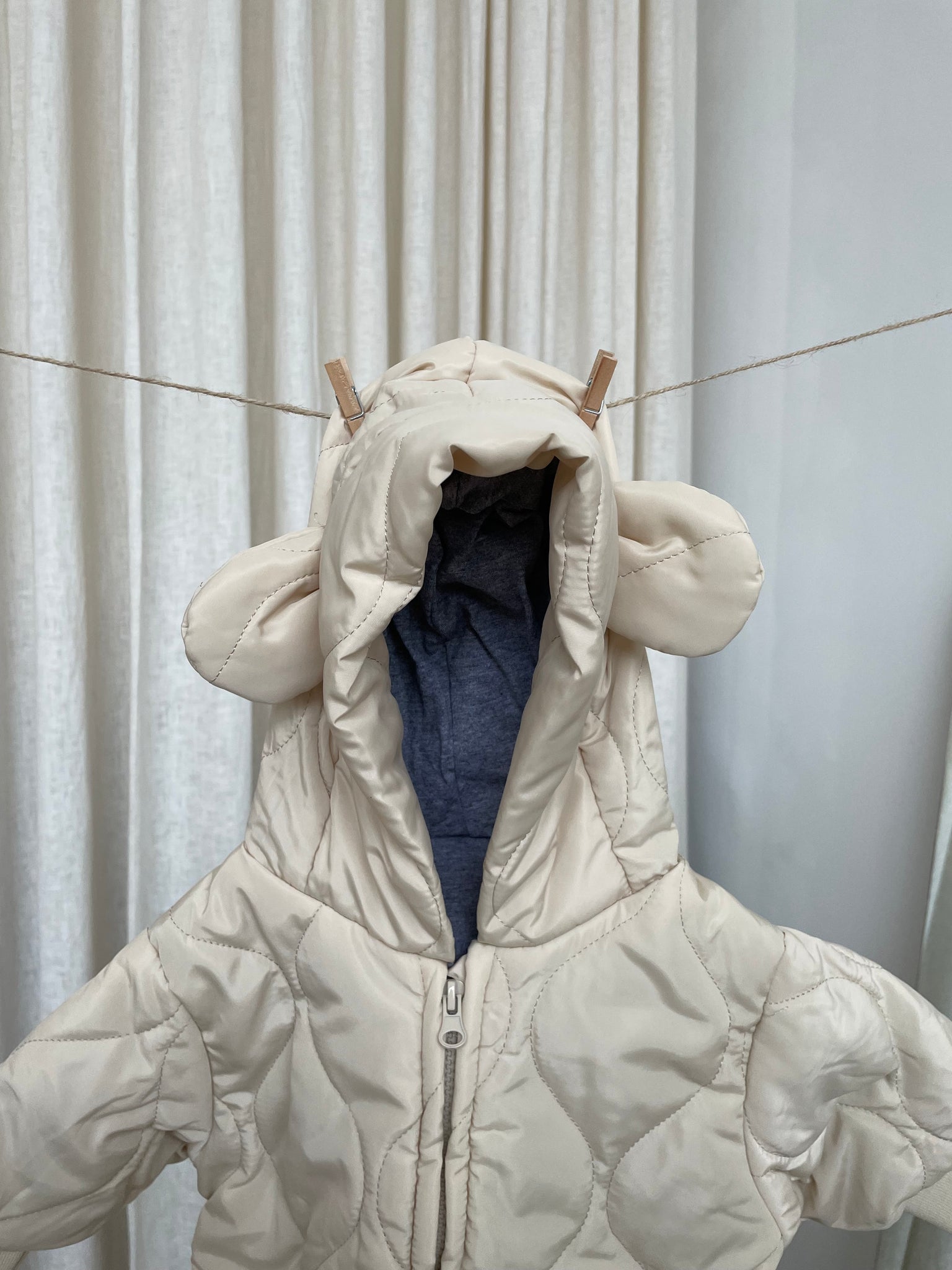 CREAM ONESIE PUFFER