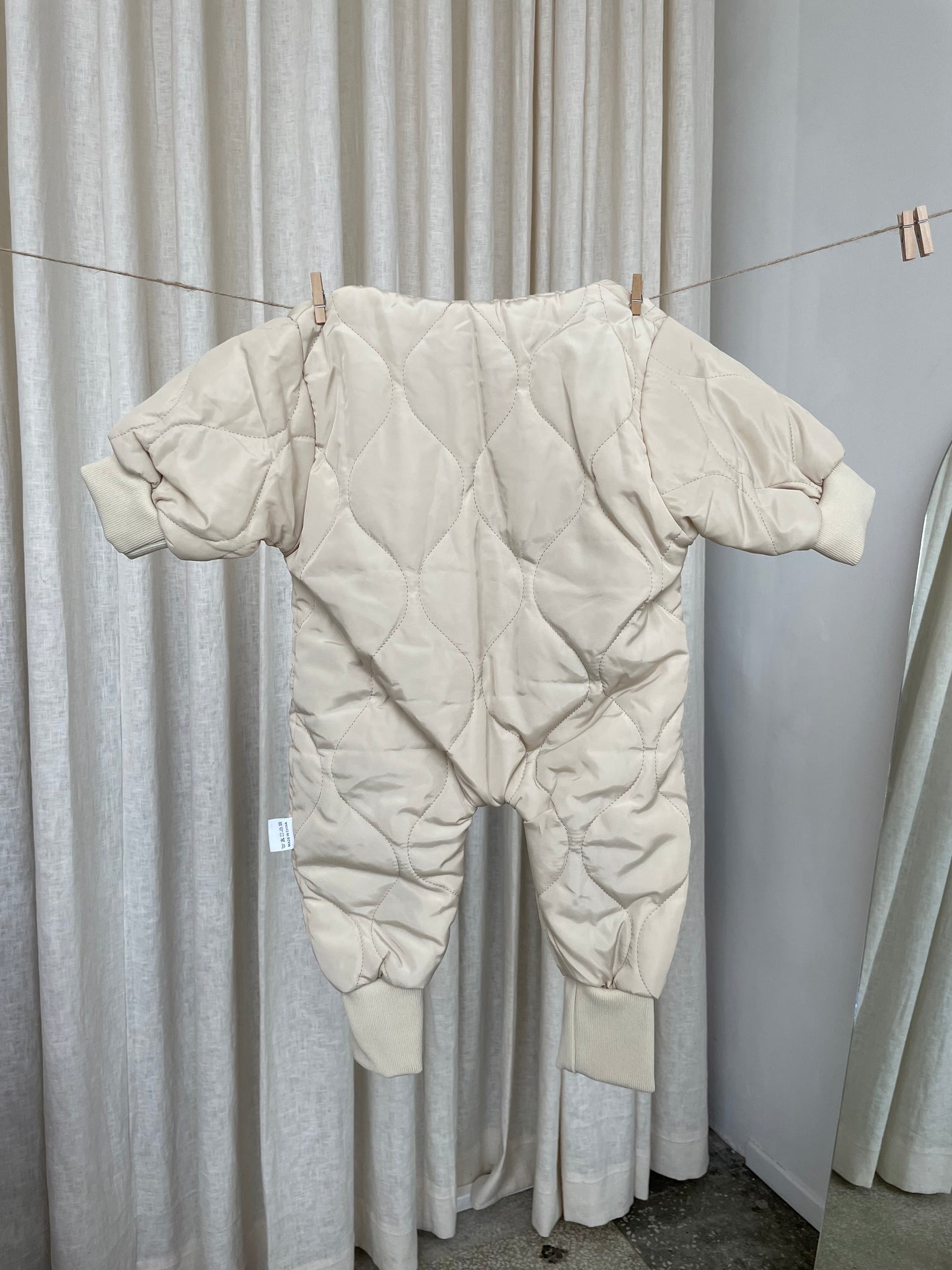 CREAM ONESIE PUFFER