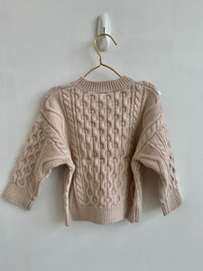 BUNDLED UP IN BEIGE SWEATER