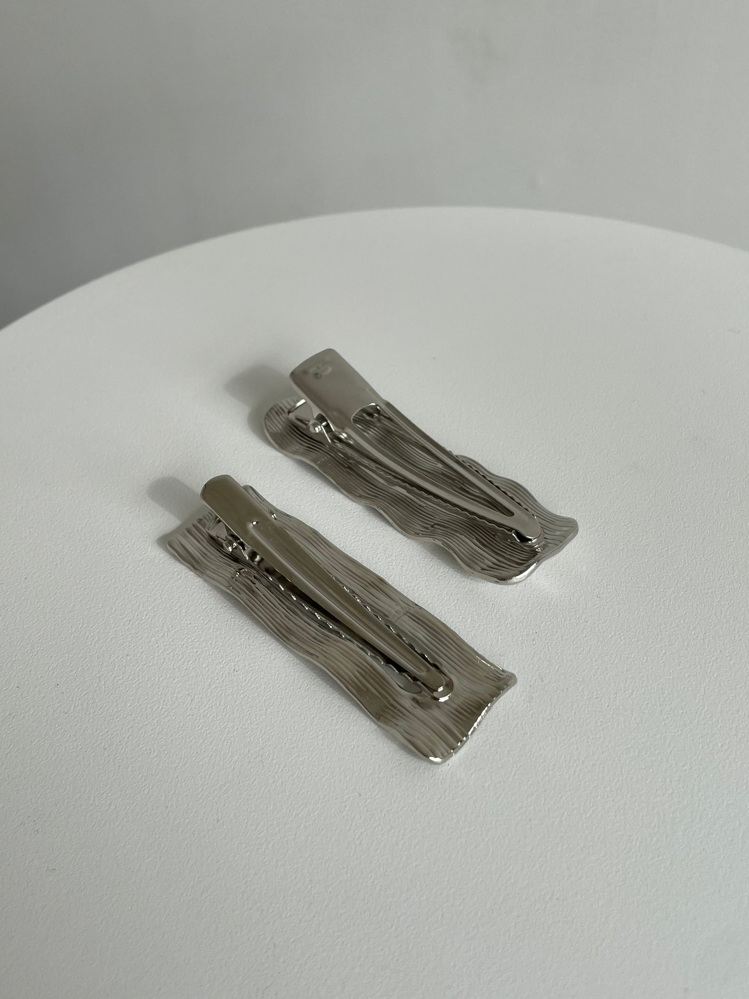 WAVY SILVER BARRETTES
